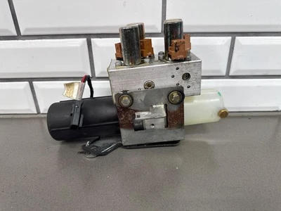 Motor hidráulico elevador convertible Chevrolet SSR 03-06 (solo motor) Foto 1 de 4