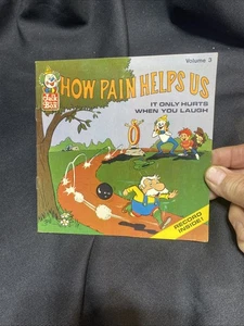 Jack in the Box: Vintage Read Along Book and Record How Pain Helps Us Promo 1976 - Bild 1 von 12