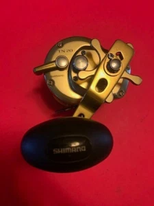 SHIMANO TRINIDAD TN 20 GOLD CONVENTIONAL FISHING REEL MINTY FRESH - Picture 1 of 15