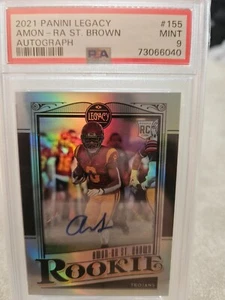 Panini Legacy 2021 - Rookies #155 Amon-Ra St. Brown automático PSA 9 - Imagen 1 de 2