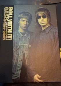 Roll With It: Oasis in Photographs 1994-2002 by Tom Sheehan Hardcover SIGNED NEW - Picture 1 of 2