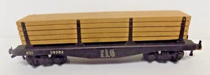 20T BOGIE TMBER WAGON WITH TIMBER LOAD OO GAUGE - EARLY MODEL PRESSED METAL MADE - Picture 1 of 6