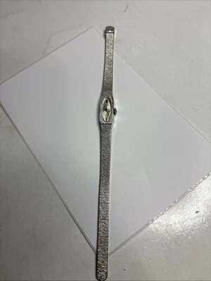 Reloj Wittnauer Geneve vintage para mujer tono dorado suizo ovalado cuerda manual 7,5 pulgadas de largo Foto 1 de 4