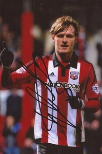 BRENTFORD: JOHN SWIFT SIGNED 6x4 ACTION PHOTO+COA - Picture 1 of 1