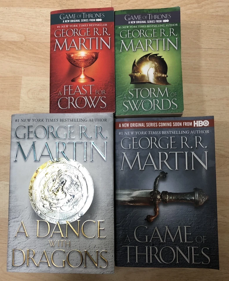 George R.R. Martin 4 Book Lot A Feast for Crows Game of Thrones Storm of Swords - Image 1 of 1