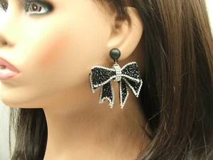 Orecchini pendenti goccia fiocco nero con cristalli trasparenti e neri - Foto 1 di 3