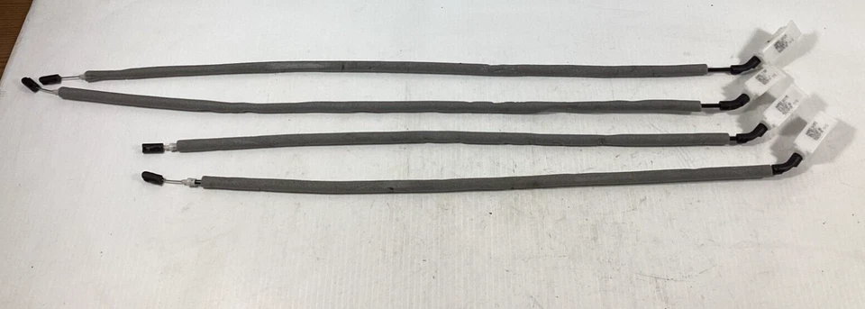 Juego de 4 cables Bowden de liberación de manija abridor de puerta interior BMW X5 2007-2016 OEM. Foto 1 de 4