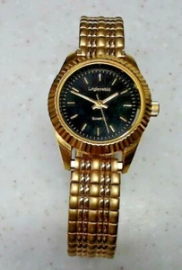Reloj de cuarzo analógico vintage Lindenwold para mujer bisel acanalado tono dorado horas - Imagen 1 de 6