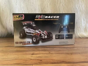 New Bright RC Racer Desert Armor 27 MHz Chrome Lightning - Picture 1 of 3