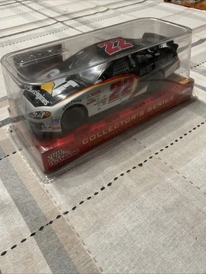 2003 Ward Burton #22 Cat Truck Engines 1:24 Racing Champions NASCAR Diecast - Image 1 of 4