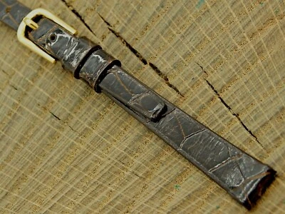 Correa de reloj Stylecraft NOS vintage de cocodrilo marrón sin usar hebilla tono dorado 9 mm Foto 1 de 4