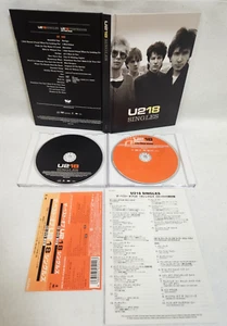 U2 18 Singles Japan CD + DVD Limited Edition UICI 9015 w/OBI 48page Booklet 2006 - Picture 1 of 14
