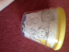 Plastic Children’s flower pot with colouring pictures inside
