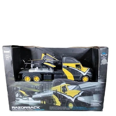Helicóptero de control remoto IWave Razorback 3 Chanel y camión Chanel RC de 4 años 14+ Foto 1 de 4