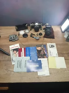 Olympus OM10 Camera Bundle 2 Lenses, Sigma 200mm Flash, and Paperwork - Picture 1 of 22