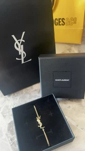 BRAND NEW Yves Saint Laurent YSL Gold-Tone Triple Charm Bracelet (RRP: £325) - Picture 1 of 3