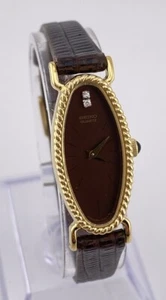 Vintage Seiko Gold Tone Oval Brown Diamond Dial Slim Watch Elegant Classy - Picture 1 of 14
