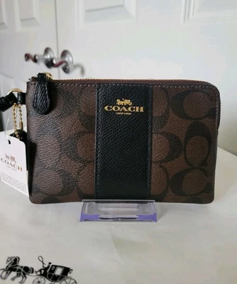 NUEVO CON ETIQUETAS COACH Signature Muñequera Esquina Cremallera Lona Cuero Rayas Marrón Negro  Foto 1 de 4