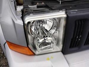 Used Right Headlight Assembly fits: 2009 Jeep Commander halogen Right Grade B