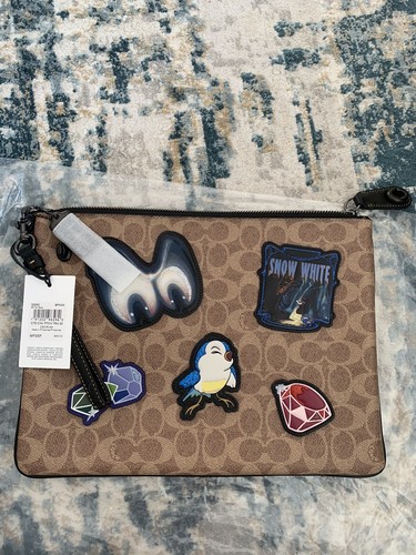 Polso nuovo con etichette Disney X Coach con serratura a chiave 30 pollici firma patchwork