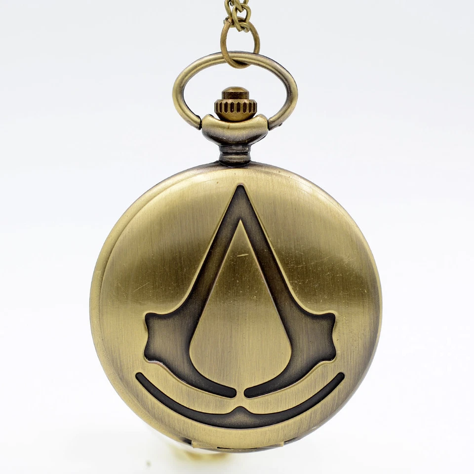 MONTRE A GOUSSET ASSASSIN'S CREED NEUF QUARTZ COULEUR OR - Photo 1/3