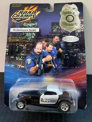 1/43 ROAD CHAMPS ROAD CHAMPS PLYMOUTH MERODEADOR TUSTIN COCHE DE POLICÍA Foto 1 de 2