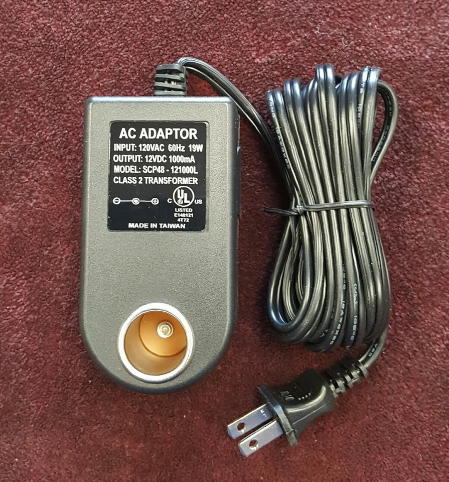 RP1201B Universal AC Power Adapter with DC Outlet Socket 120vac to 12vdc 1000ma - Image 1 of 1