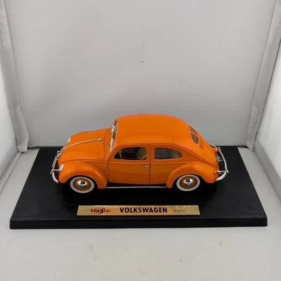 Coche diecast Maisto 1951 Volkswagen Bug 1:18 naranja edición especial. Foto 1 de 4