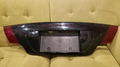 Pontiac Sunfire 2000-2002 cupé tapa maletero matrícula retenedor luz trasera OEM Foto 1 de 4
