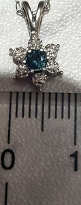 Natural Diamonds and Sapphire Flower Necklace with 14k chain, 1.2 grams - Picture 1 of 8