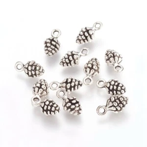 10 Small Antique Silver Tone Winter Christmas Pine Cone Shaped Charms 13x7mm - Picture 1 of 1