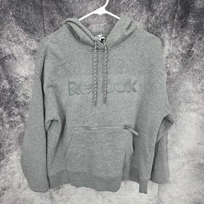 Sudadera con Capucha Reebok Para Mujer Gris Medio Sudadera con Capucha Suéter Bolsillos Foto 1 de 4