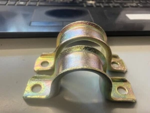 Abrazaderas de cremallera de dirección originales Ford Escort MK 1/2 reacondicionadas - Imagen 1 de 2