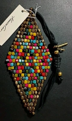 NUEVO CON ETIQUETAS KENNETH COLE Colorido Diamante Panel Con Cuentas Brazalete Firmado Dorado Negro Foto 1 de 4