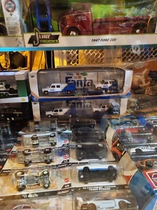 M2 Machines Fanta CHASE Auto Hauler 1973 GMC SIERRA & GMC JIMMY SIERRA NEW - Picture 1 of 1