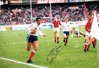 serge blanco france charges towards a try against wales signed 12x8 photo