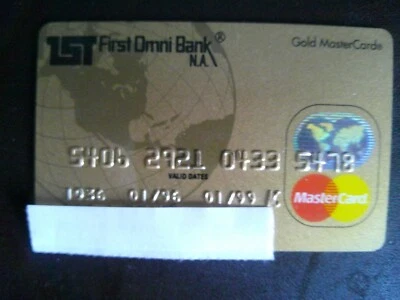 VINTAGE *FIRST OMNI BANK GOLD MASTER CARD* RARE EXPIRED CREDIT CARD.  Exp. 1/99. - Image 1 of 2