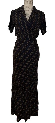 REFORMATION Danika Midi Mangas Cortas Envoltura Frontal Talla Grande. Elegante y versátil Foto 1 de 4