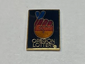 Vintage Oregon Lotterie Staat Lotto Anstecknadel Tack Regenbogen Geheimnis gekreuzter Finger - Bild 1 von 2