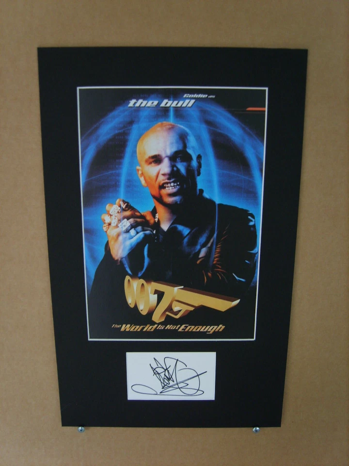 Goldie James Bond Genuine Signed Authentic Autograph - UACC / AFTAL. - Image 1 of 1
