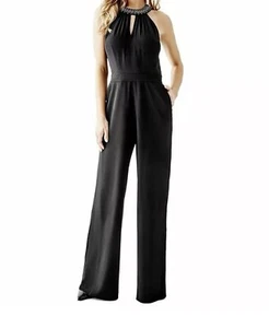 Tuta Guess nera impreziosita buco della serratura gamba larga colletto strass donna 2 - Foto 1 di 19