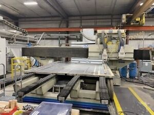 1995 KOMO VR1008TTe twin table twin spindle CNC Router Fanuc 18K RPM W60" x 96L"