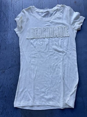 Camiseta vintage Y2K blanca/crema Abercrombie & Fitch para mujer talla mediana” Foto 1 de 3