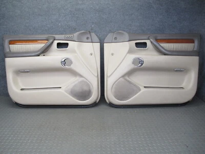 LEXUS LX470 2004-2007 JUEGO DE PANELES DE CUBIERTA DE PUERTA INTERIOR DELANTERA IZQUIERDA Y DERECHA Foto 1 de 4