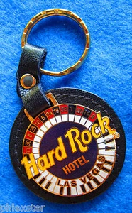 HOTEL LAS VEGAS *LLAVERO DE MESA DE PIANO Y RULETA* LLAVERO DE CUERO Hard Rock Café - Imagen 1 de 1