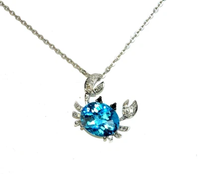 14k, COLGANTE CANGREJO, TOPACIO AZUL, DIAMANTE BLANCO, TOPACIO CORTE CUÁNTICO Foto 1 de 4