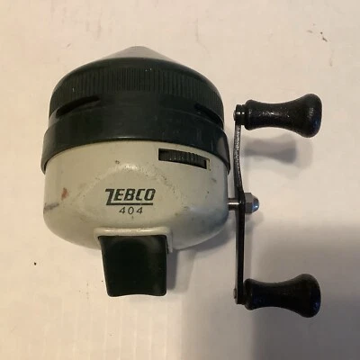 CARRETE SPINCASTING CARA CERRADA ZEBCO #404 VINTAGE HECHO EN EE. UU.🐠 Foto 1 de 4