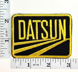 Embroidered Patch - Gold/Black - NEW - Iron-on - Nissan - Japanese Auto - Datsun - Picture 1 of 1