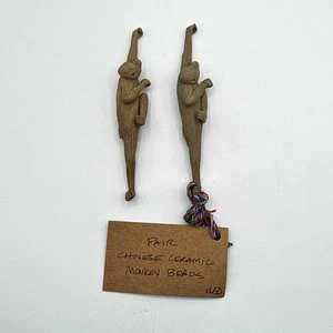 Par de cuentas de mono de cerámica china - Imagen 1 de 7