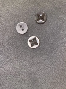 12 PC PKG. NEW 1/2 INCH SMOKE GRAY PEARL FINISH STAR DESIGN BUTTON - Bild 1 von 2